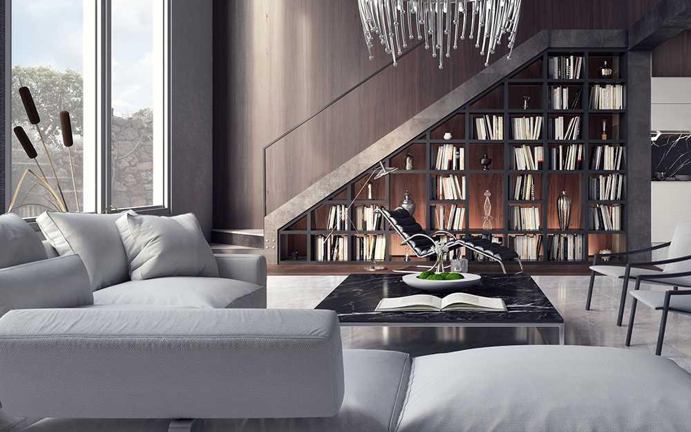 A living room features a built-in bookcase beneath a staircase.