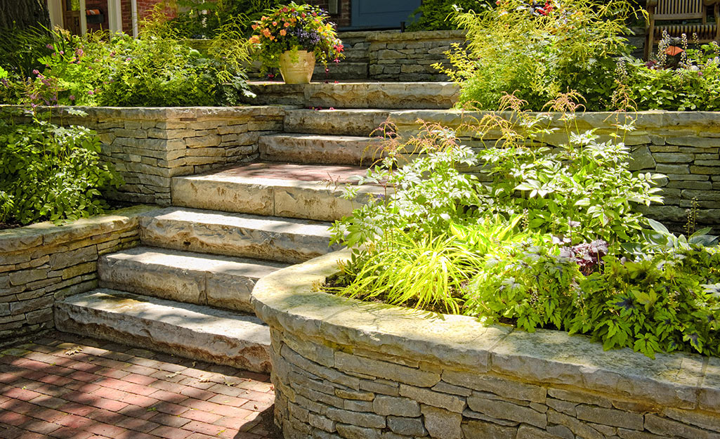 Stone steps with raised planting beds Stone steps with raised planting beds