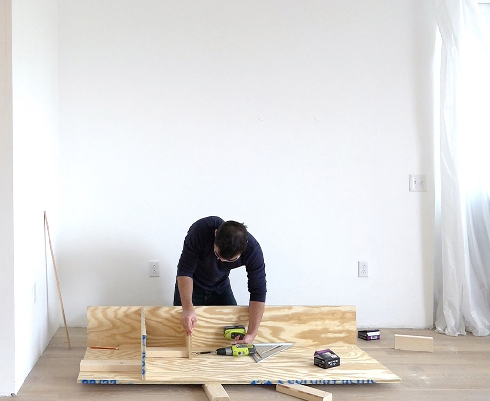 A person connecting shelves