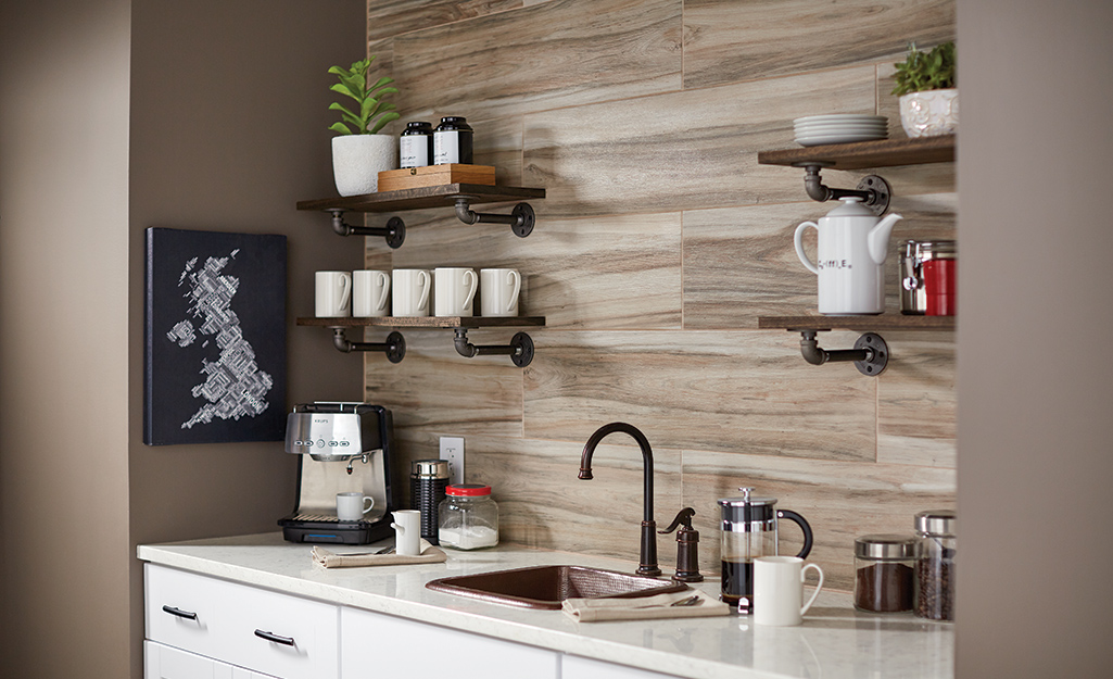 A kitchen with a ceramic tile backsplash.
