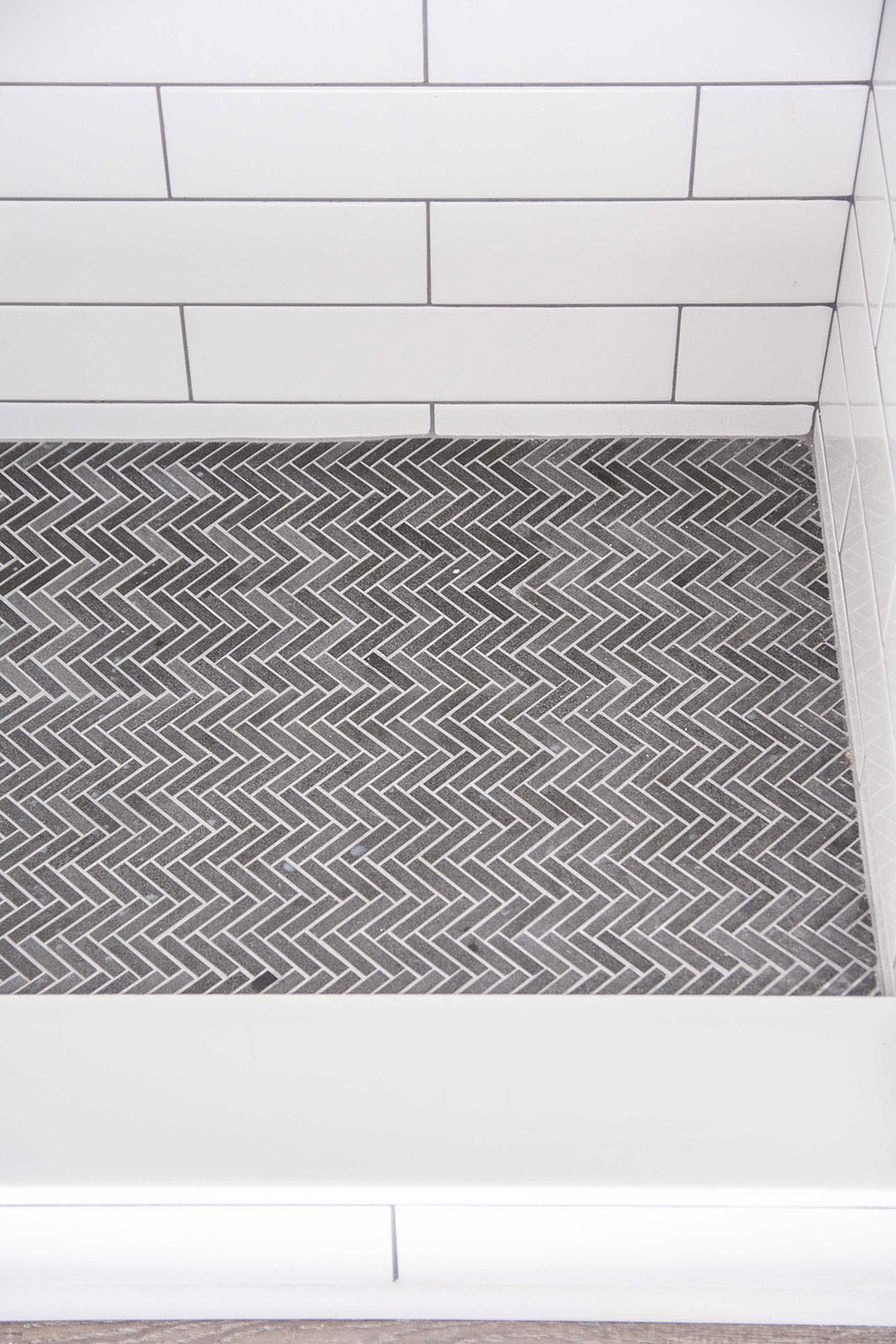 https://contentgrid.homedepot-static.com/hdus/en_US/DTCCOMNEW/Articles/classic-tile-for-a-walk-in-shower-renovation-image-6.jpg