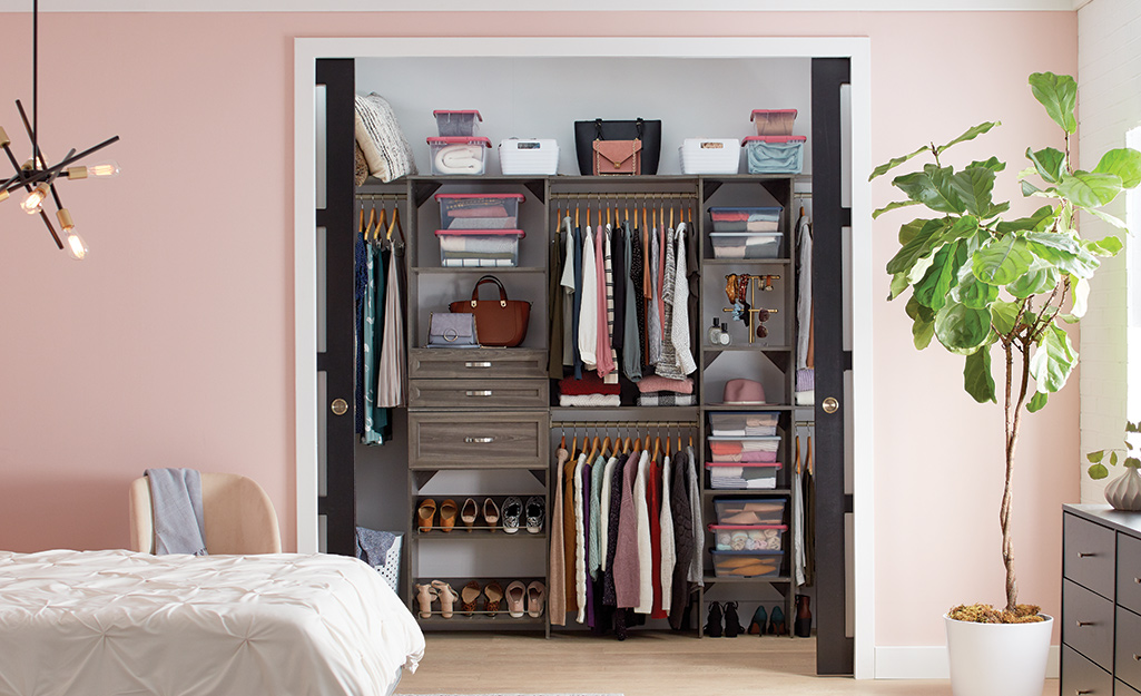 A closet with shelves for organization.