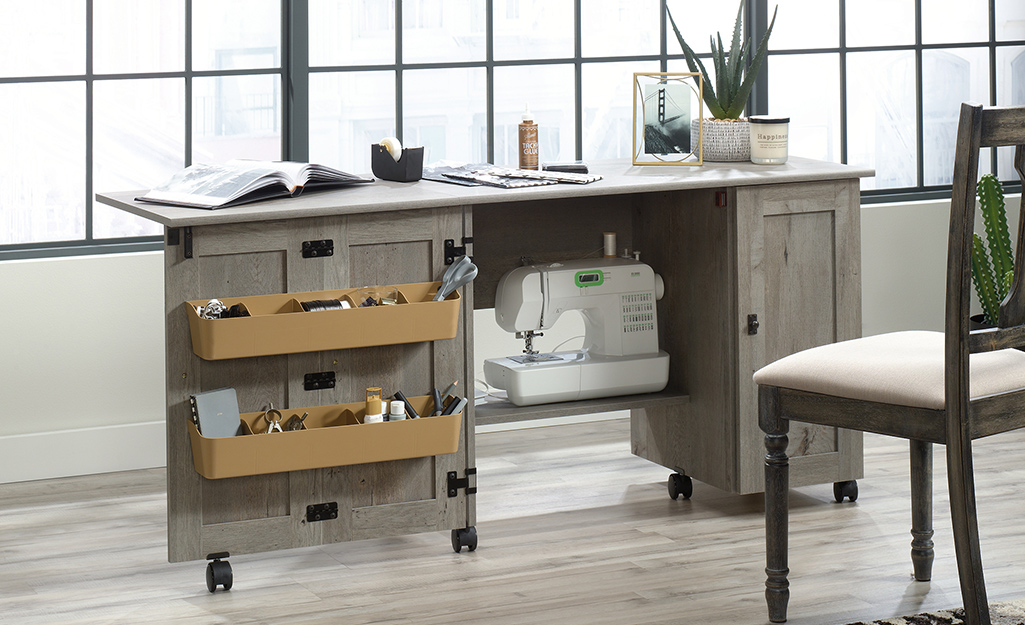Office desk on wheels with crafting supplies