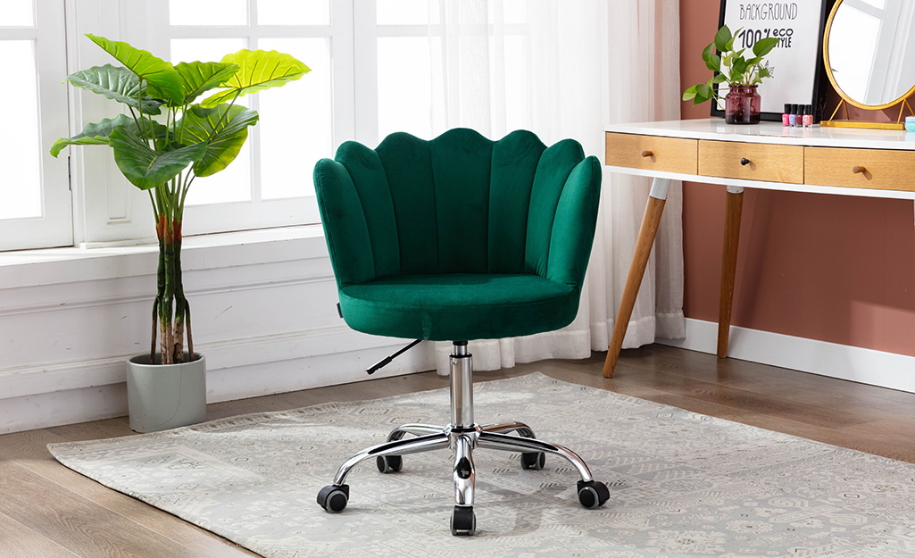 Green upholstered swivel office chair