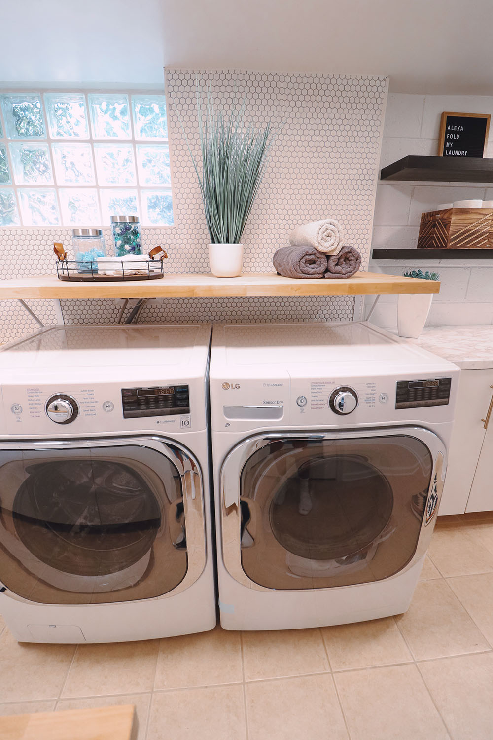 A white LG front load washer and dryer.