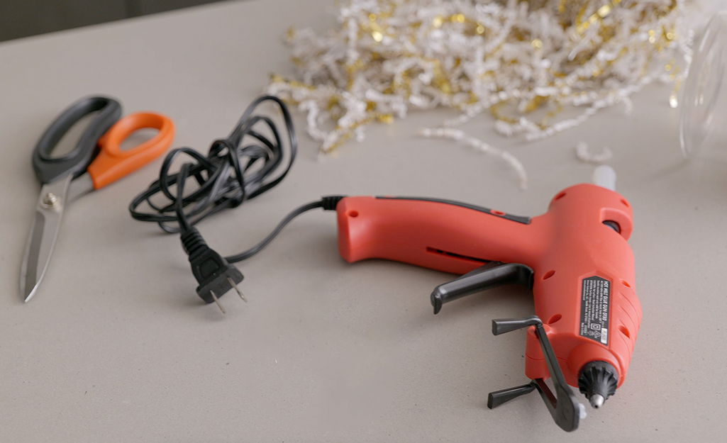 How to Wrap a Gift — A Glue Gun Is Your Secret Weapon for Perfectly Wrapped  Presents
