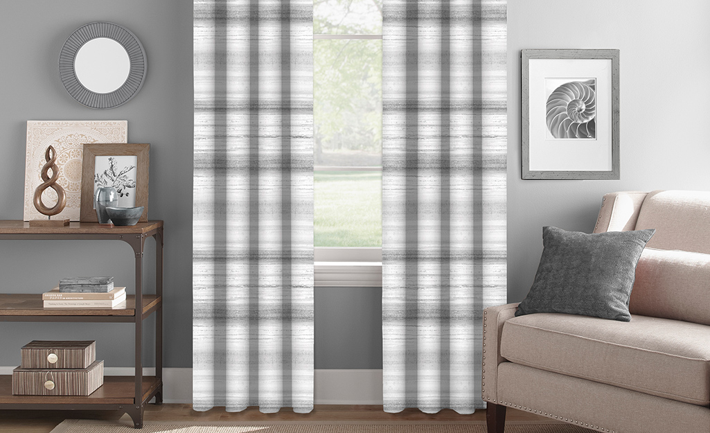 Striped gray and white curtains in a living room.