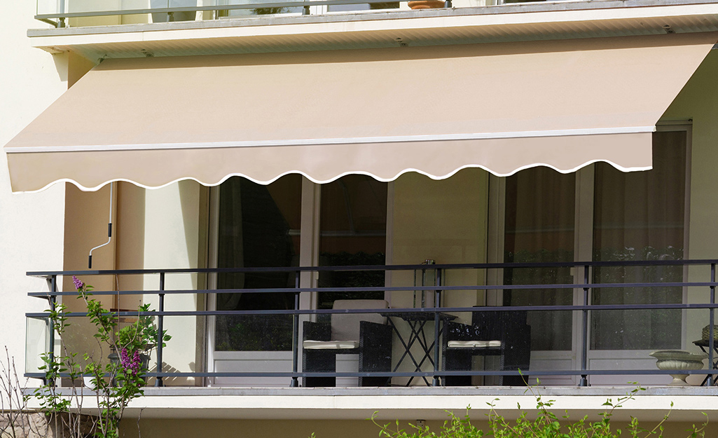 An outdoor awning covers a patio.