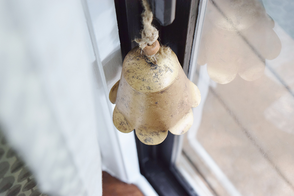 Bell hanging on door