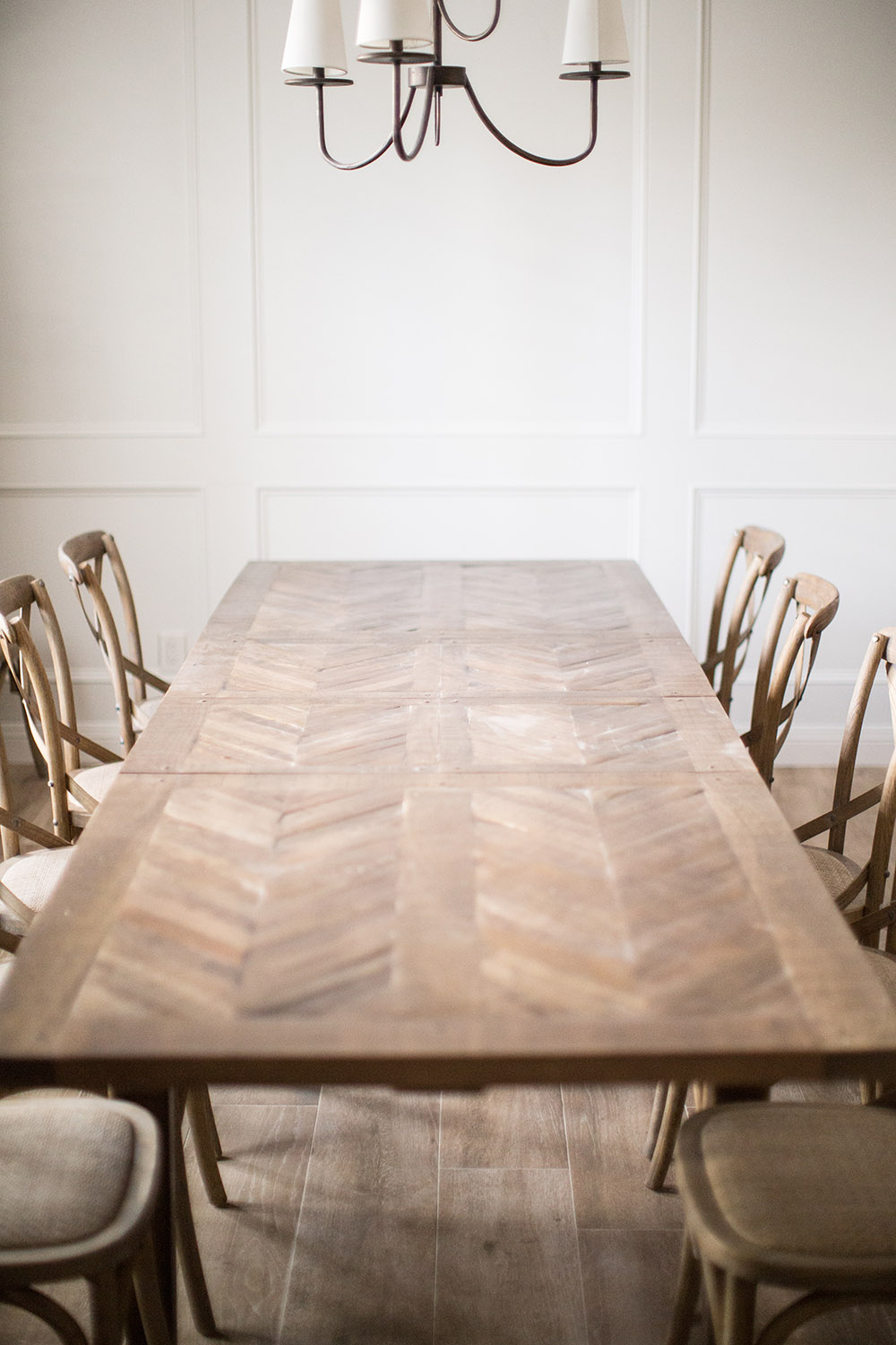 A large dining room table fully extended. A large dining room table fully extended.