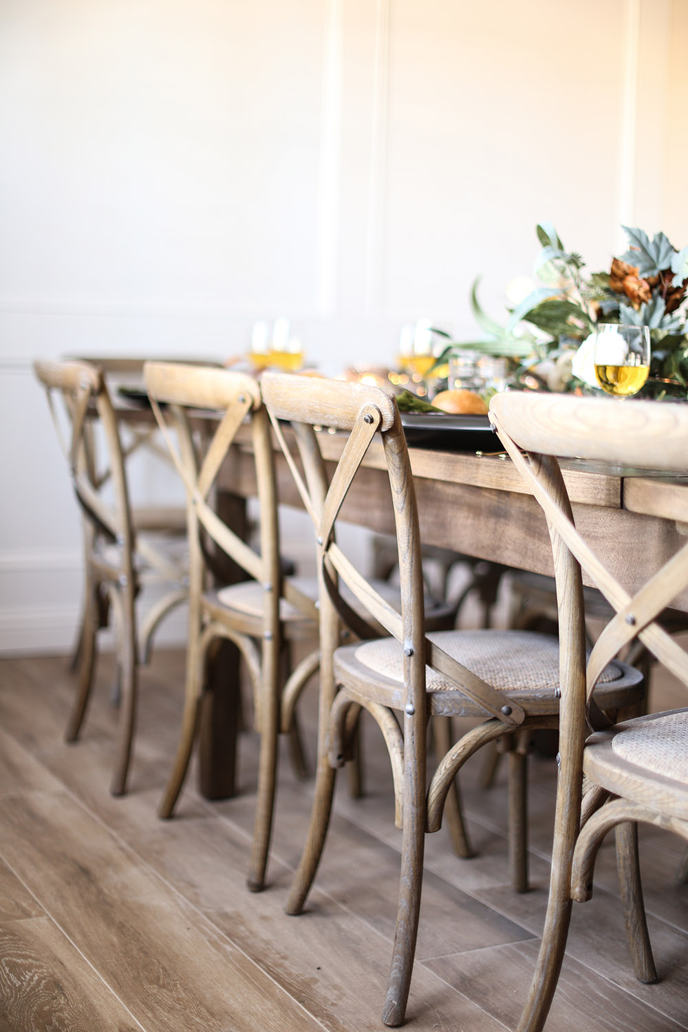 A dining table with grey wood dining chairs. A dining table with grey wood dining chairs.