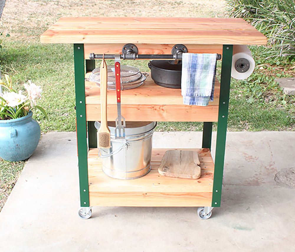 Completed grilling cart with wheels and accessories.