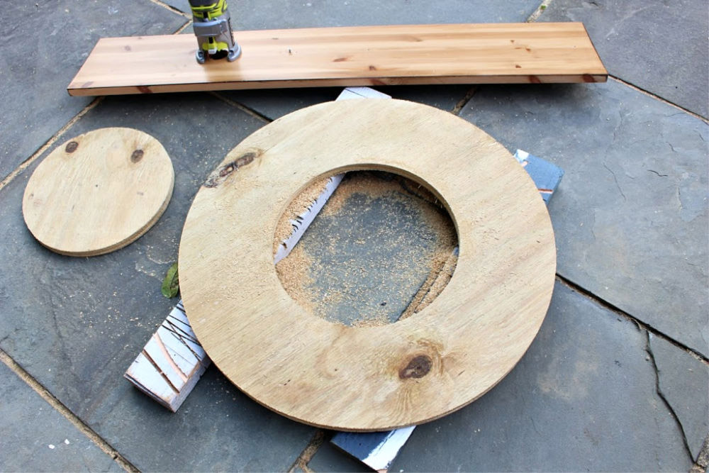 A circle cut out of wood.
