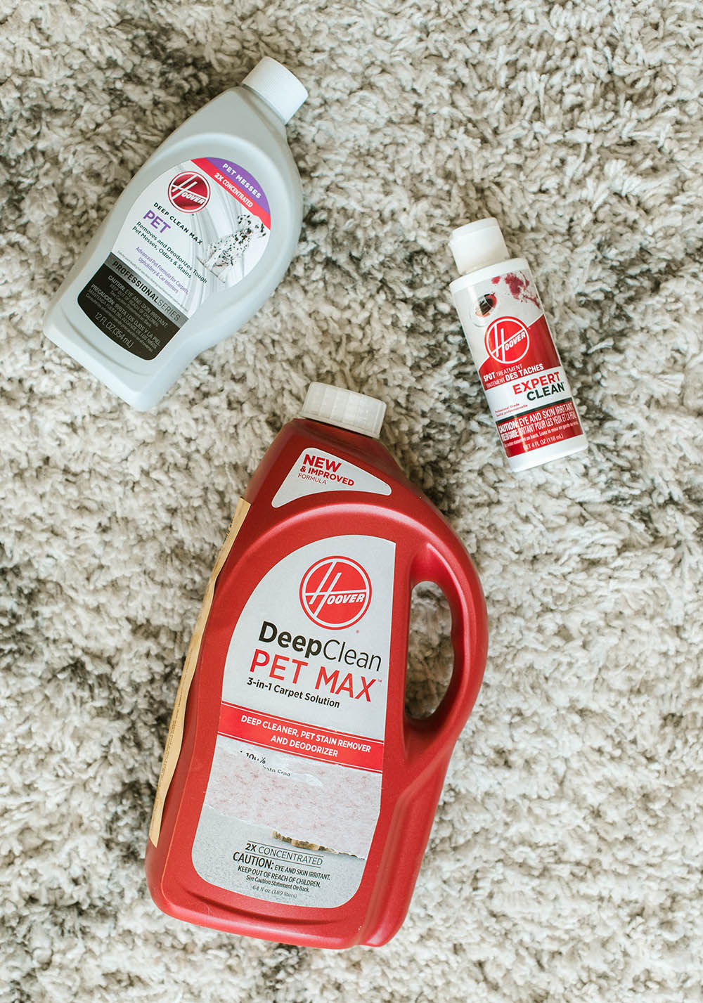 Various Hoover cleaning products that can be used with the Hoover SmartWash advanced pet carpet cleaner.