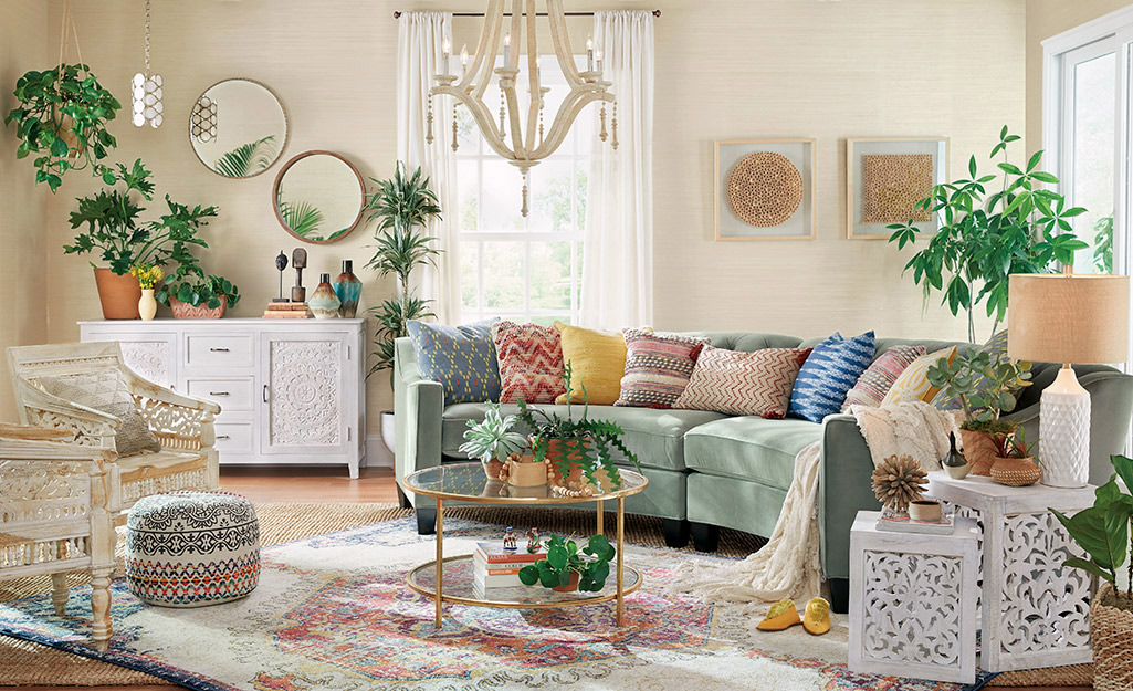 A living room filled with house plants. A living room filled with house plants.