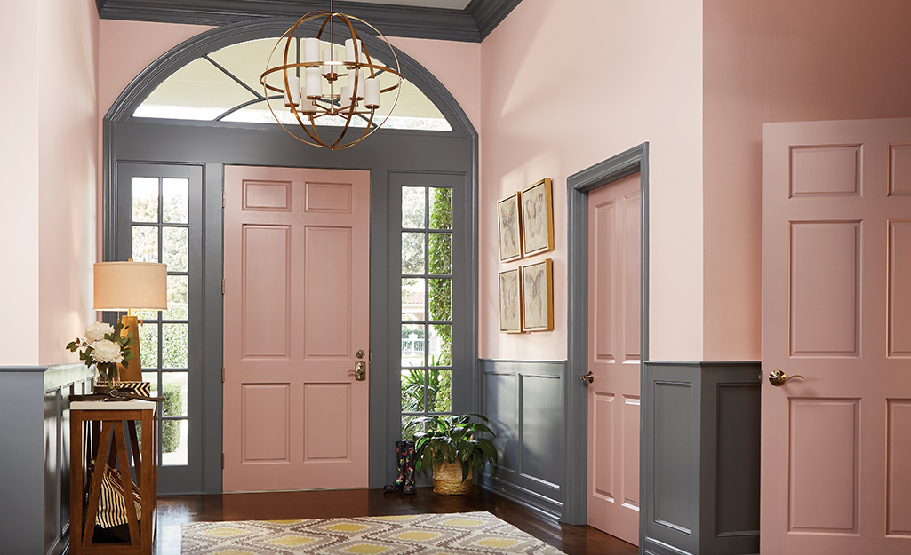 Entryway painted pink and gray.