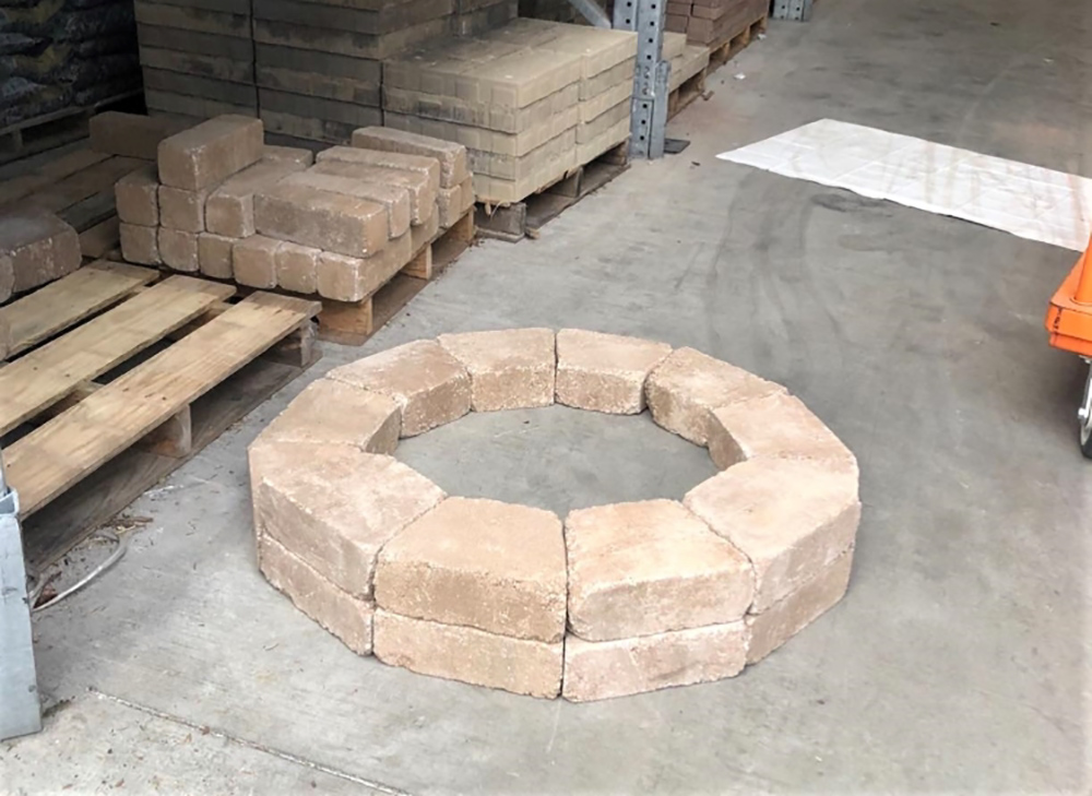 A shot of pavers placed in a circle for a fire pit