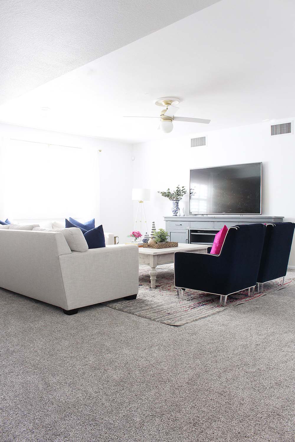 A family media room with new Lifeproof carpet.