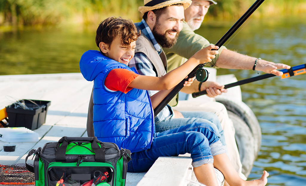 A family fishing from a boat.