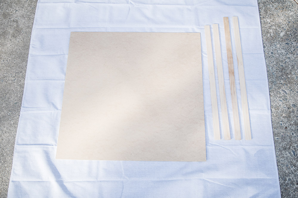 Plywood laying on a white sheet Plywood laying on a white sheet