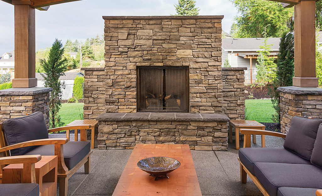Outdoor fireplace on a patio.