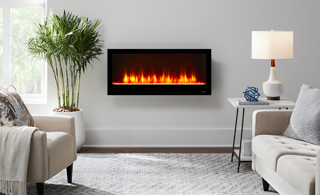 A wall-mounted fireplace in a living room.