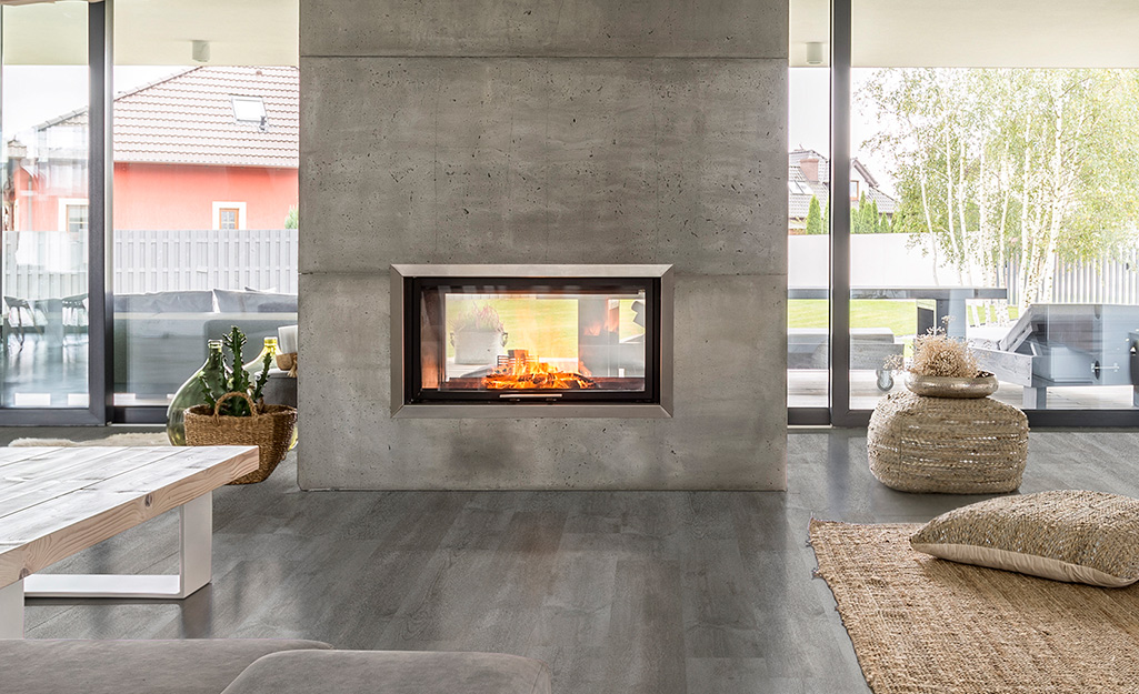 Concrete gives this fireplace a modern look.