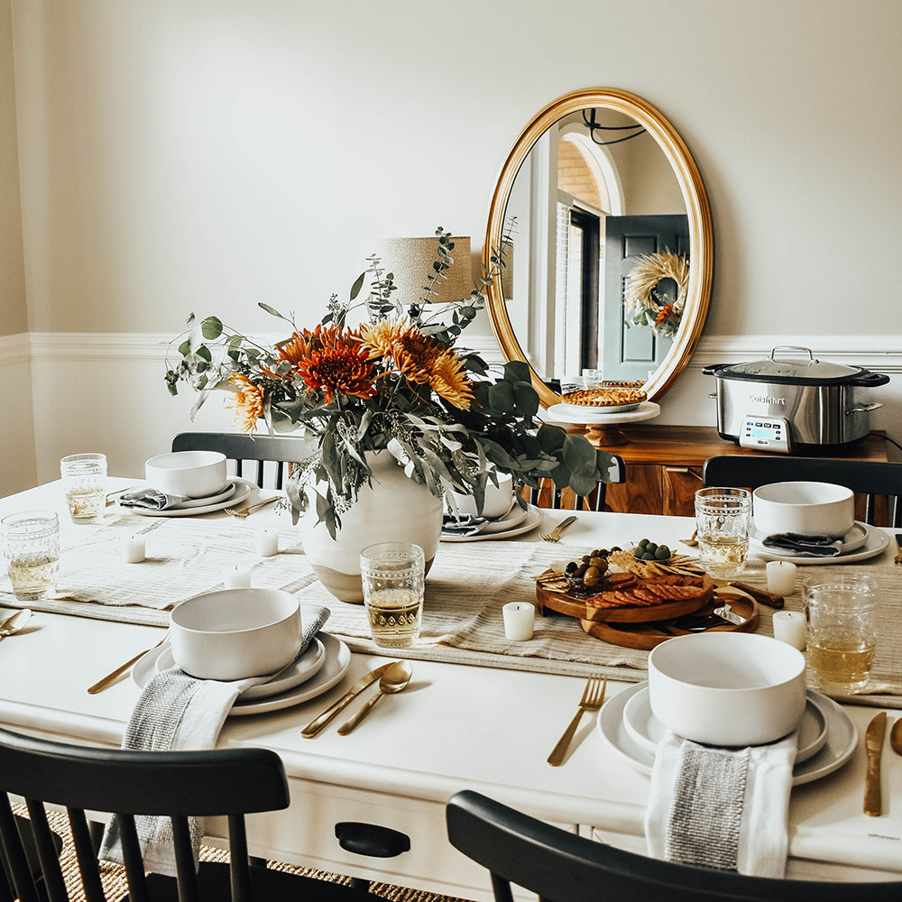 A dining table prepped for Friendsgiving.