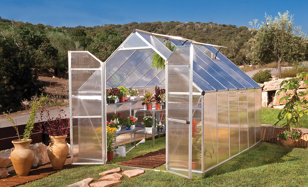 A greenhouse that was built from a kit. 