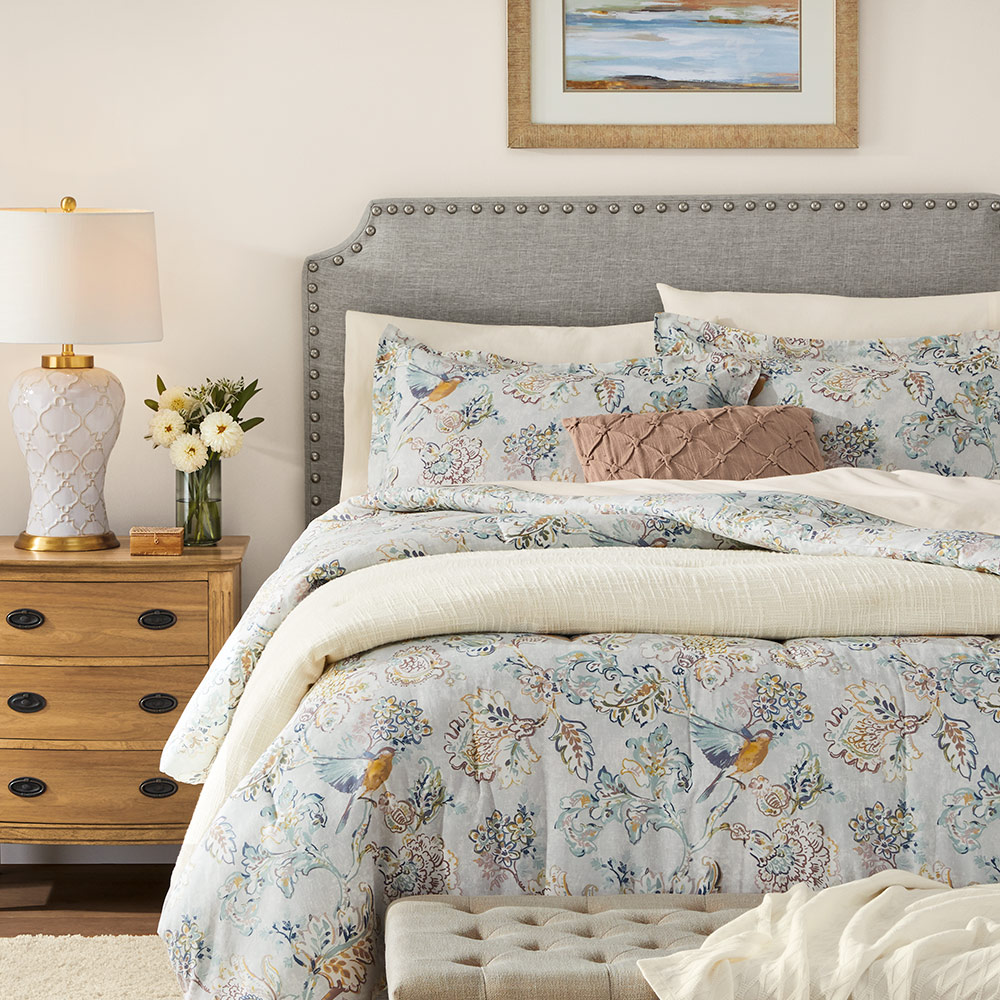 Guest bed with blue bedding