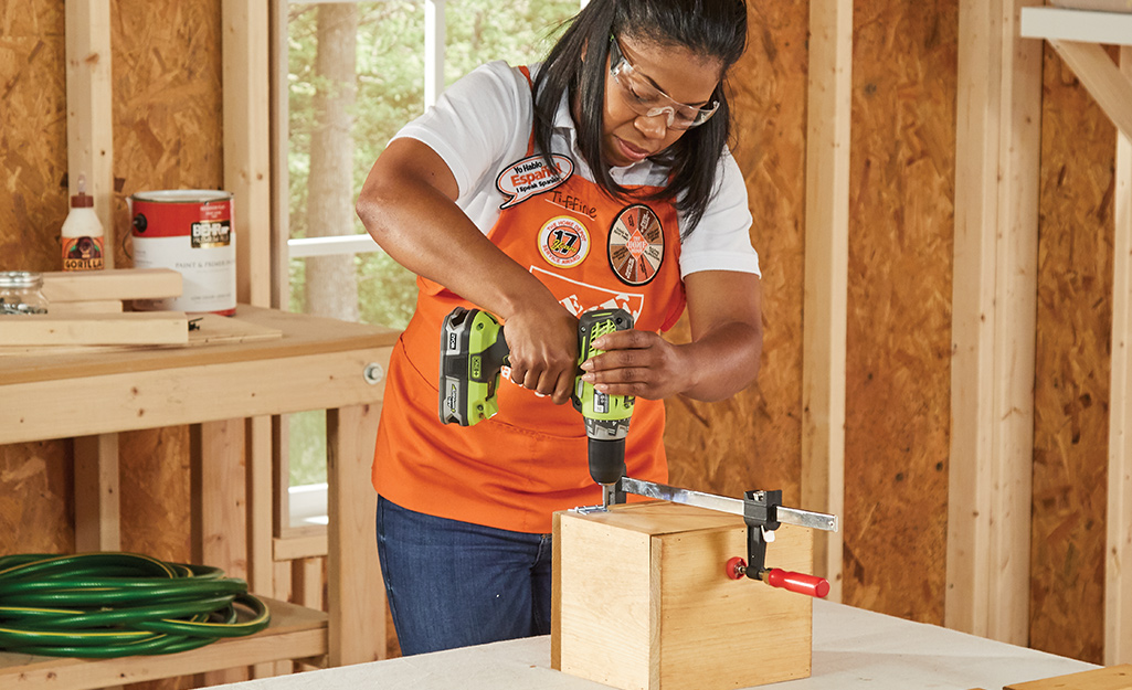 A woman assembles her candy holder. A woman assembles her candy holder.