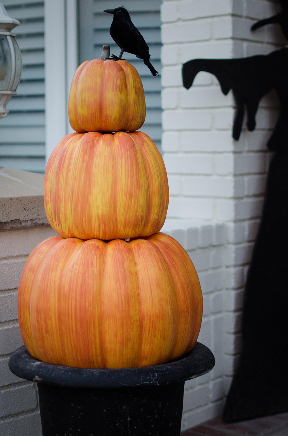 Pumpkins stacked as outside decor Pumpkins stacked as outside decor
