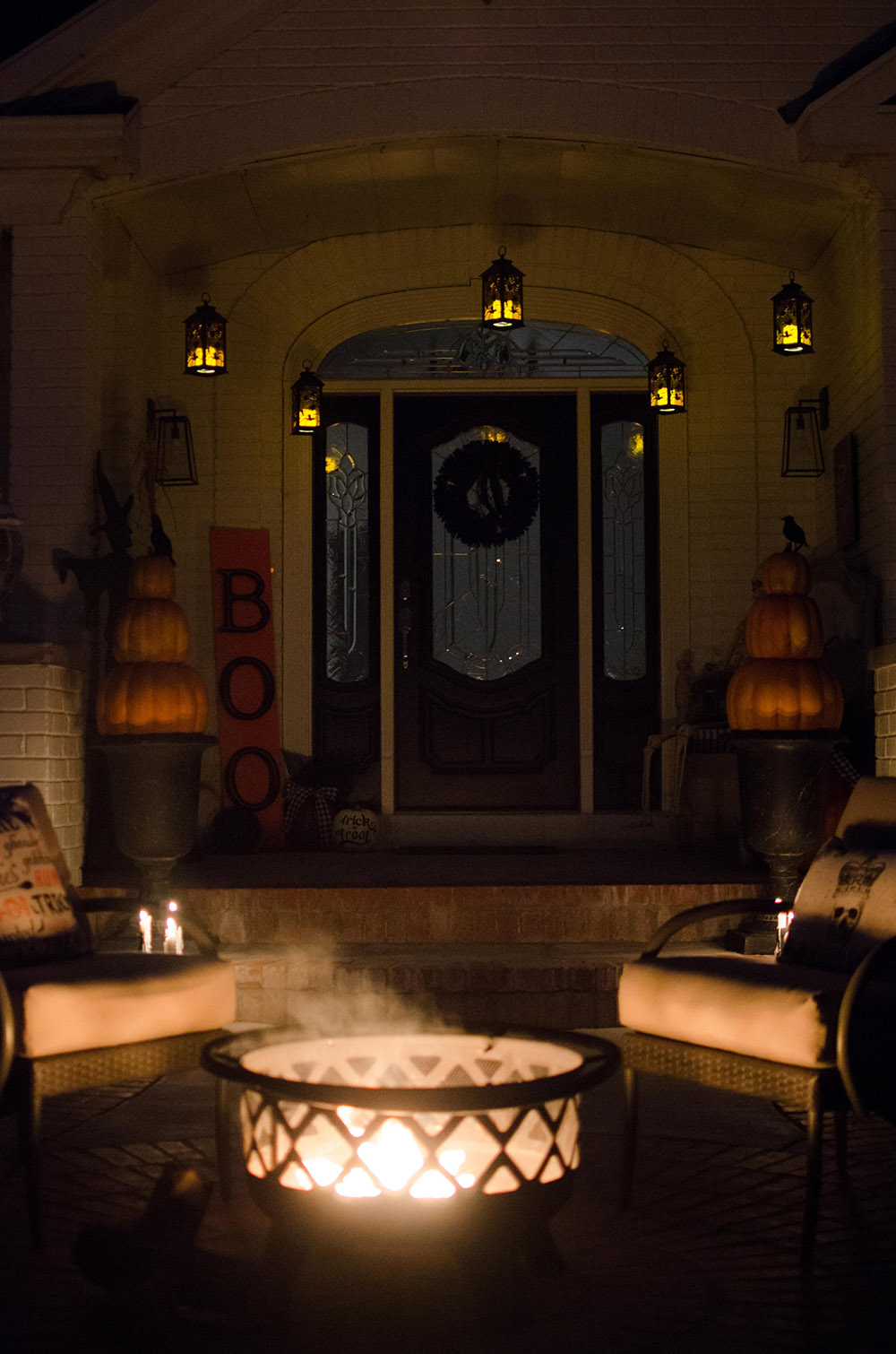 Fire pit and patio furniture set at night Fire pit and patio furniture set at night