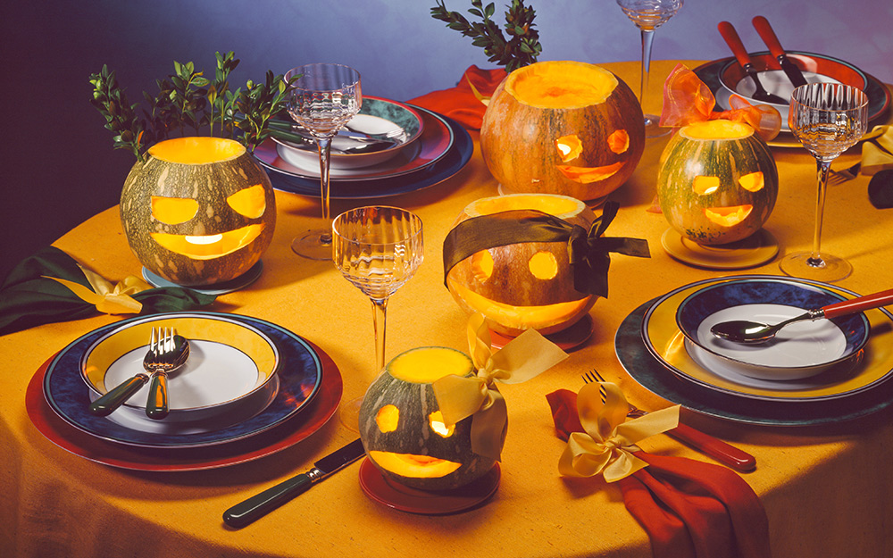 A table with jack o' lanterns on top.