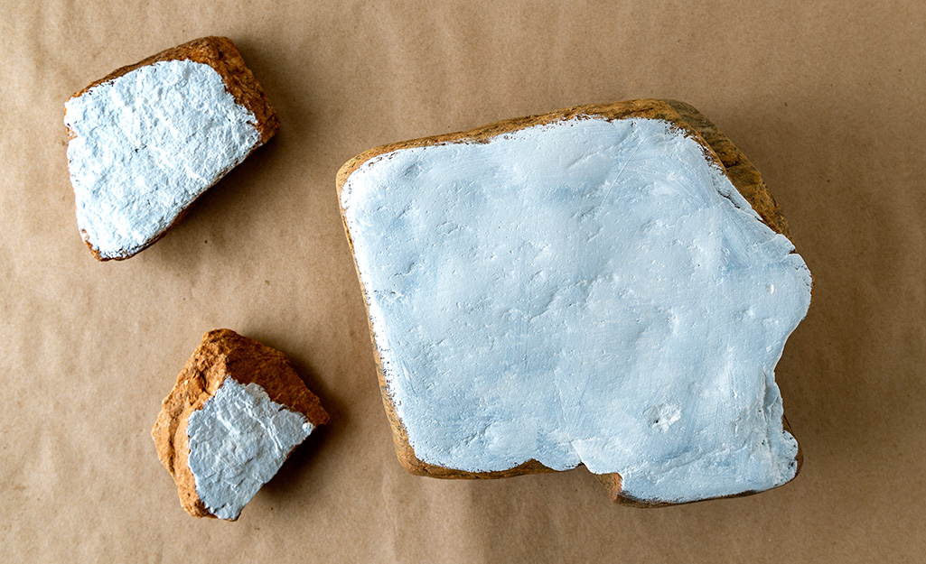 Rocks with the tops painted white.