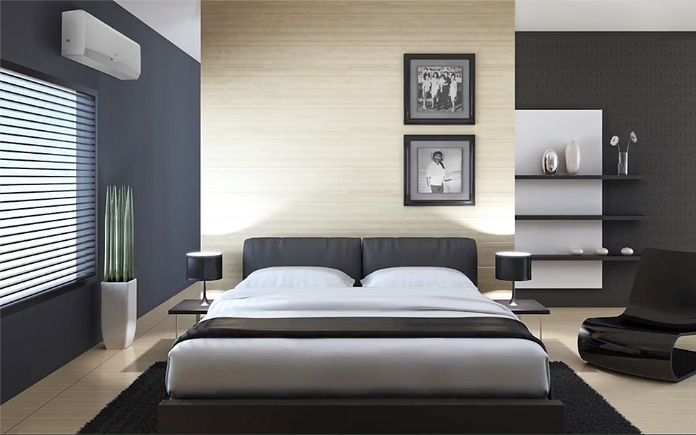 A modern style master bedroom with a mini split on the wall.