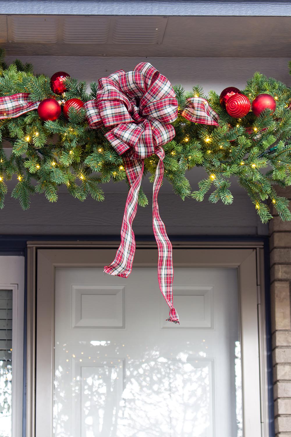 Ribbon reef on front porch garland