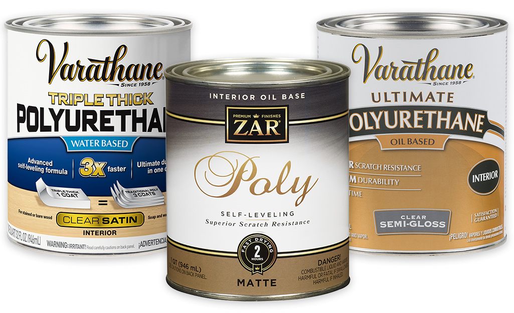 Three paint cans holding water-based and oil-based types of polyurethane.