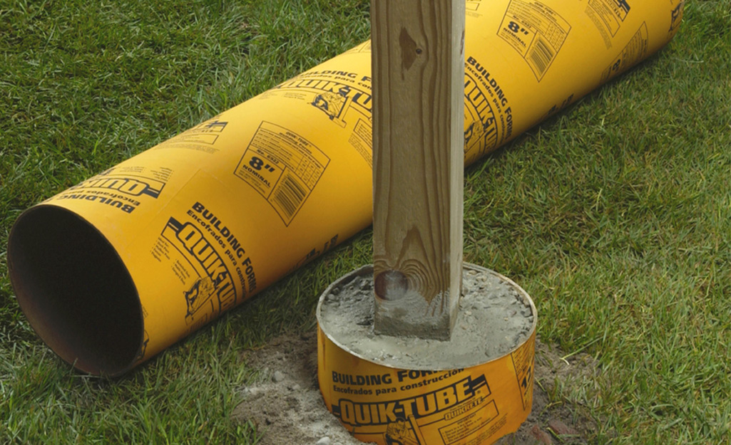  Concrete poured into a post-hole to support a post.