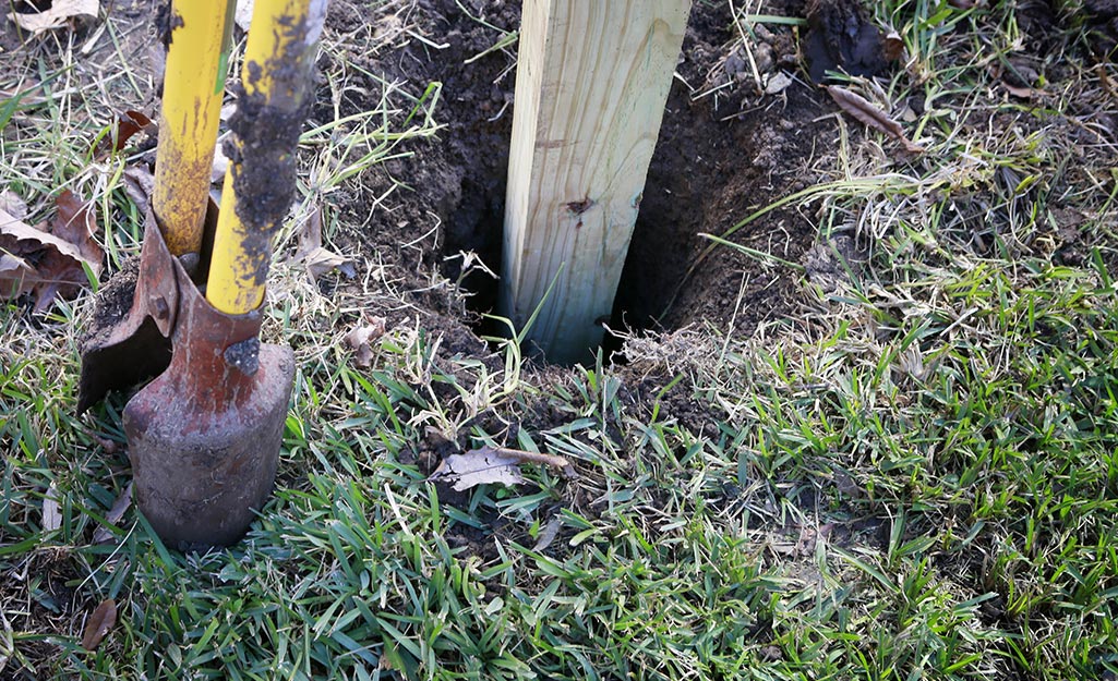 A post inserted into a hole in the ground. A post inserted into a hole in the ground.