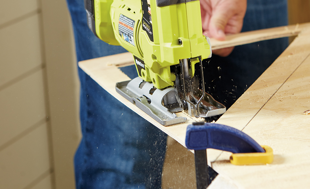 A circular saw is used to cut the triangle shape.