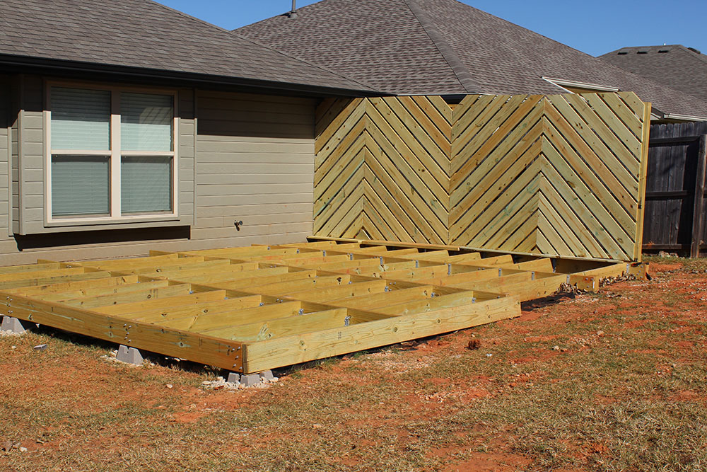 Chevron privacy wall added on side of foundation