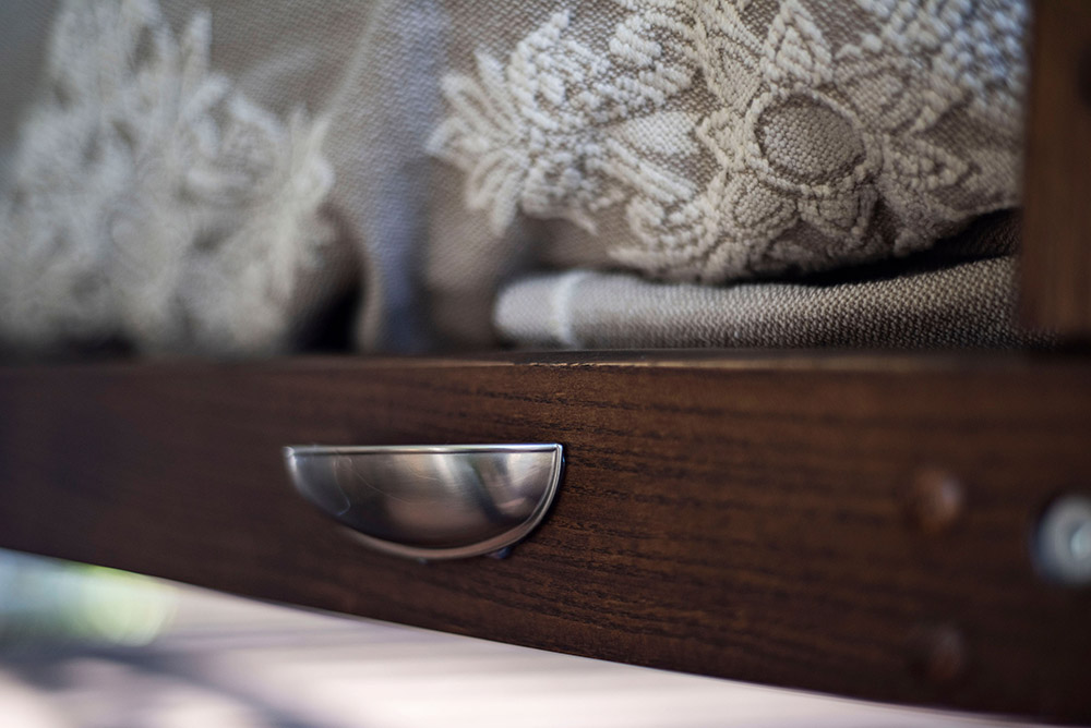 Drawer pull on bench swing