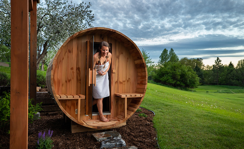 A woman leaving a sauna.