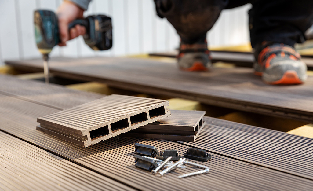 A close up of tools to build the floor of a shed.