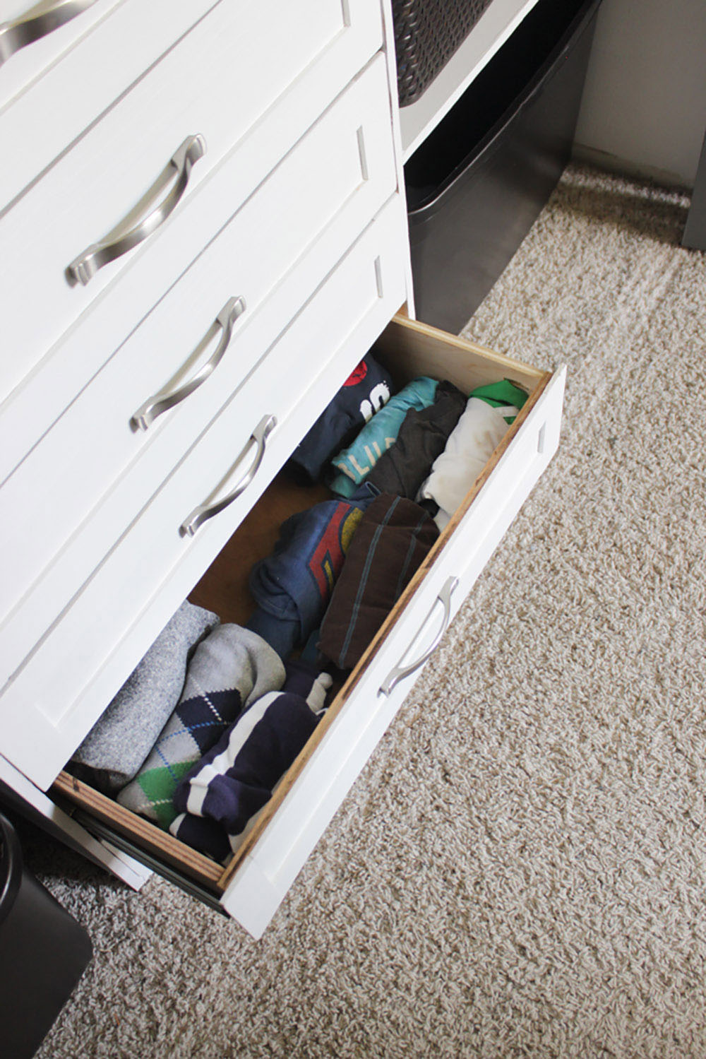Open drawer of closet organizer 