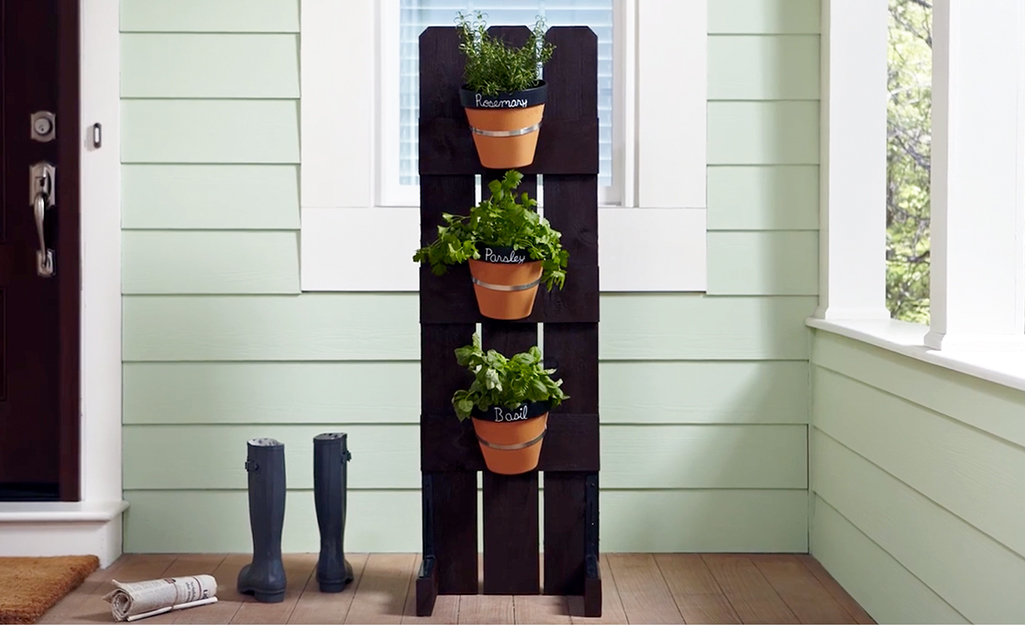 Vertical herb garden planter on a porch