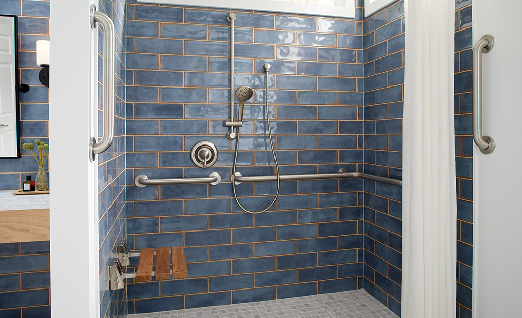 A shower with many grab bar options.