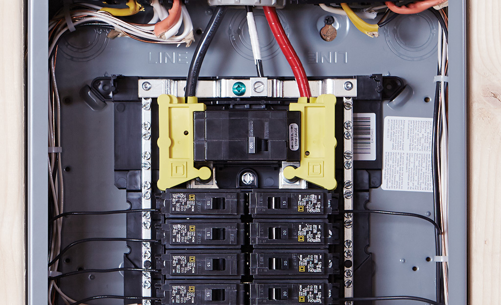 A main breaker in an electrical panel.