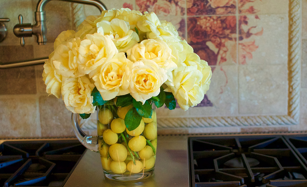 Yellow rose bouquet in a vase